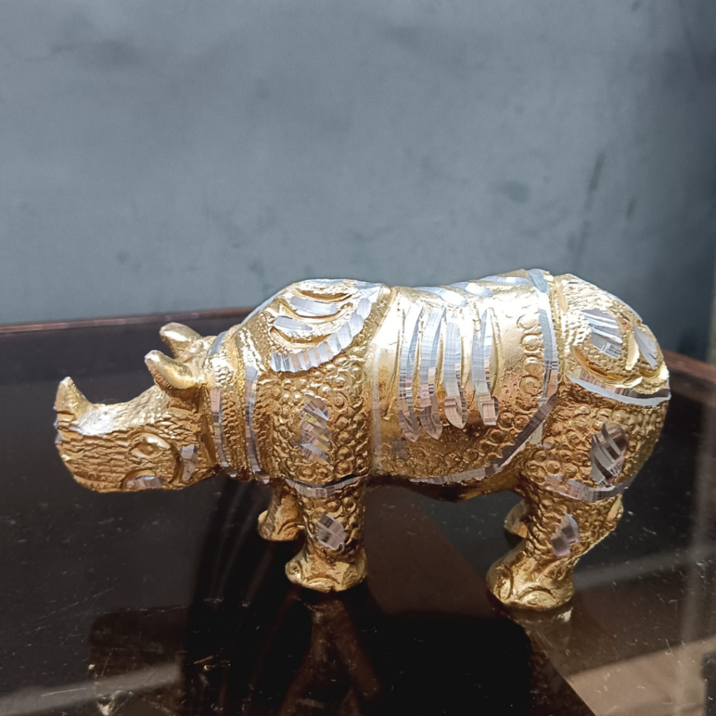 Golden Rhinoceros Figurine with Silver Accents – Unique Decor