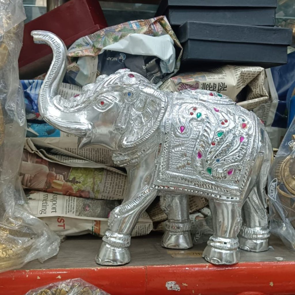 Exquisite Silver Elephant Figurine with Gemstone Embellishments